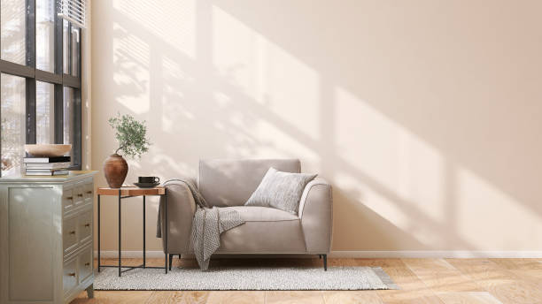 Brown suede leather armchair, brass side table and pastel green wooden cabinet in modern and luxury beige wall and rug on parquet floor room with dappled sunlight from window for interior decoration, lifestyle and architecture product display